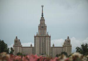 Stunning front view of Moscow State University against a cloudy sky.
